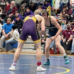 Lake facing opponent on the mat